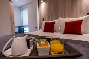 Postel nebo postele na pokoji v ubytování Hotel H9