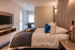 Postel nebo postele na pokoji v ubytování Hotel H9