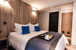 Postel nebo postele na pokoji v ubytování Hotel H9