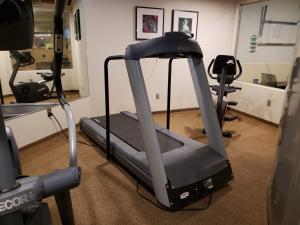 a room with a gym with a treadmill at Best Western Snowcap Lodge in Cle Elum