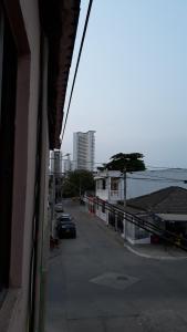 a view of a street from a building with a car at LA MEDELLIN HOSTAL in Cartagena de Indias