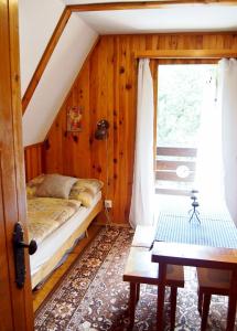 Postel nebo postele na pokoji v ubytování chata Milena
