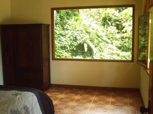 Ένα ή περισσότερα κρεβάτια σε δωμάτιο στο Villa Vista Verde Ground Floor Home, Save Hundreds on your trip, Reduced Prices on Tours +6 φωτογραφίες
