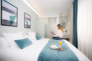 Postel nebo postele na pokoji v ubytování Palacios Rooms
