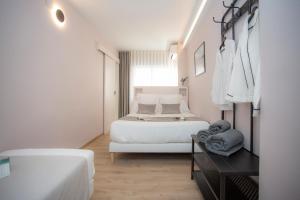 Postel nebo postele na pokoji v ubytování Palacios Rooms