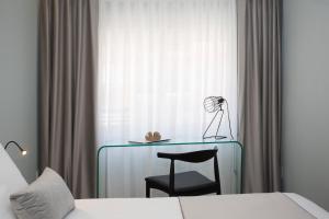 Postel nebo postele na pokoji v ubytování Palacios Rooms