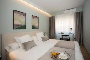 Posezení v ubytování Palacios Rooms