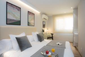 Posezení v ubytování Palacios Rooms