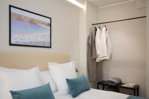 Postel nebo postele na pokoji v ubytování Palacios Rooms