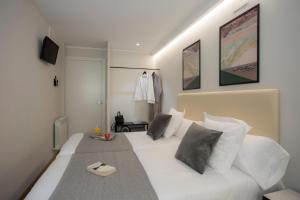 TV a/nebo společenská místnost v ubytování Palacios Rooms