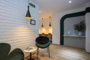Posezení v ubytování Palacios Rooms