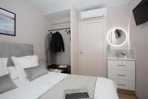 Postel nebo postele na pokoji v ubytování Palacios Rooms