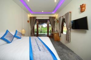 صورة لـ Hoi An Blue Seaside Homestay في Dien Ban