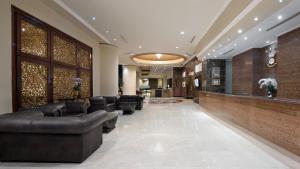 Area lobi atau resepsionis di Golden Boutique Hotel Kemayoran