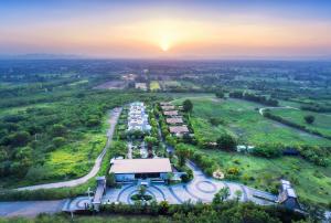 an aerial view of a parking lot at sunset at The Private Pool Villas at Civilai Hill Khao Yai in Nong Sarai