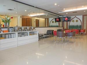 Area soggiorno di d'primahotel Airport Jakarta 1