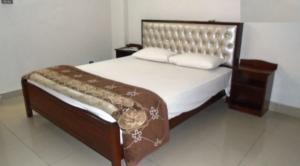 Ένα ή περισσότερα κρεβάτια σε δωμάτιο στο Solo Hotel & Restaurant