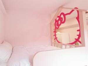Moon Shine B&B tesisinde bir odada yatak veya yataklar