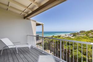 a balcony with a view of the ocean at Wake up to ocean views in stylish comfort in Sunshine Beach
