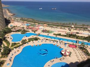 an aerial view of the pool at the resort at Chalets in Porto Sokhna - Pyramids - Families Only in Ain Sokhna