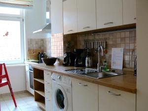 Køkken eller tekøkken på Ferienwohnung Siegers