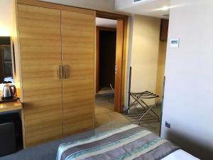 Postel nebo postele na pokoji v ubytování Efeler Hotel