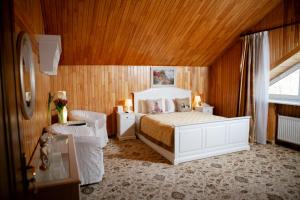 Postel nebo postele na pokoji v ubytování Park Hotel Berezka