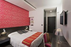 Posteľ alebo postele v izbe v ubytovaní MA Hotel