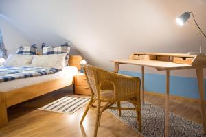 Llit o llits en una habitació de Im alten Rathaus