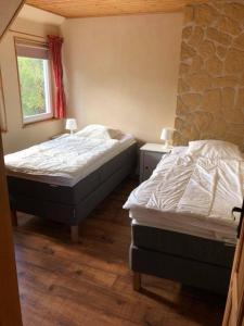 Posteľ alebo postele v izbe v ubytovaní Apartamenty Beata Wisełka