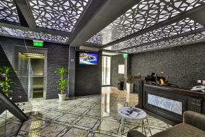 Televisyen dan/atau pusat hiburan di Hotel Premier