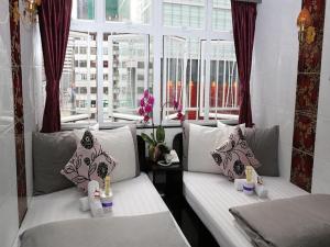 Giường trong phòng chung tại David Lounge