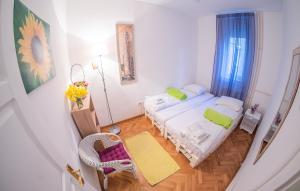 Postel nebo postele na pokoji v ubytování Hostel Beogradjanka