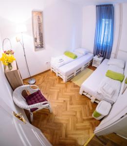 Postel nebo postele na pokoji v ubytování Hostel Beogradjanka