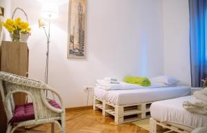 Postel nebo postele na pokoji v ubytování Hostel Beogradjanka