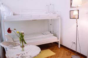Postel nebo postele na pokoji v ubytování Hostel Beogradjanka