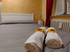 A bed or beds in a room at Residenza Manfredi