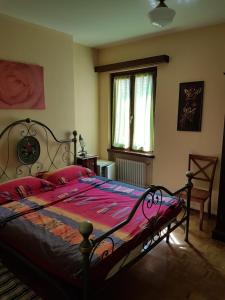 Postel nebo postele na pokoji v ubytování B&B della Pace
