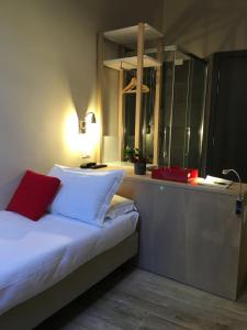 Postel nebo postele na pokoji v ubytování Hotel Centro