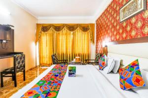 Postel nebo postele na pokoji v ubytování FabHotel Pramila Inn + 22 fotografií