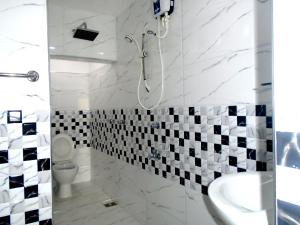 Ένα μπάνιο στο Bee Line Holiday Apartment