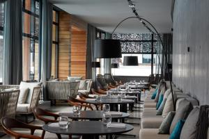 a row of tables and chairs in a restaurant at The Retreat at Blue Lagoon Iceland in Grindavík