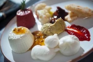a plate of food with different types of desserts at Agriturismo Masseria Calongo in Cisternino