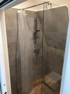 Kúpeľňa v ubytovaní Apartament na poddaszu + 5 fotografií