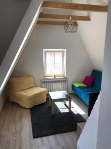Posedenie v ubytovaní Apartament na poddaszu