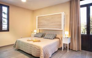 Un pat sau paturi într-o cameră la Finca La Capella