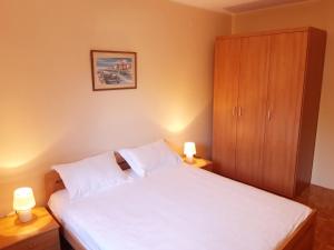 Postel nebo postele na pokoji v ubytování Apartment Maras