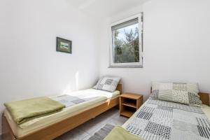 Postel nebo postele na pokoji v ubytování Modra Kuca