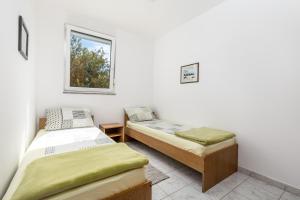 Postel nebo postele na pokoji v ubytování Modra Kuca