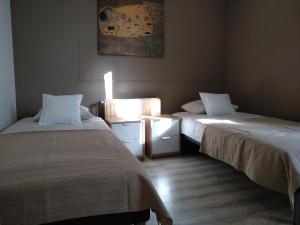 Giường trong phòng chung tại City Apartments & Gym +2 ảnh